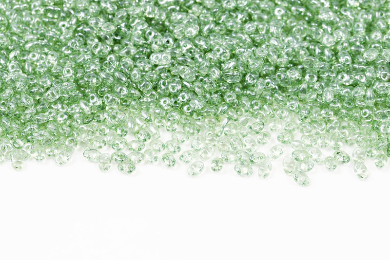 Miniduo 2×4mm Crystal Green Luster 2-Hole Czech Beads
