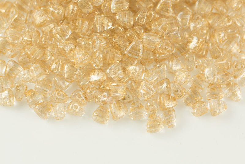 Nib-Bit 6×5mm Gold Splash Crystal 2-Hole Czech Beads