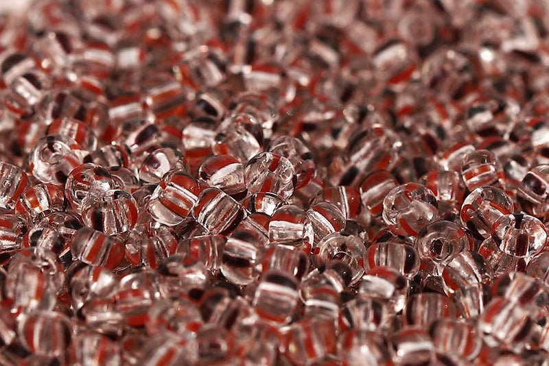 Preciosa Rocailles 6/0 Black&Red Stripes On Crystal Col.00980