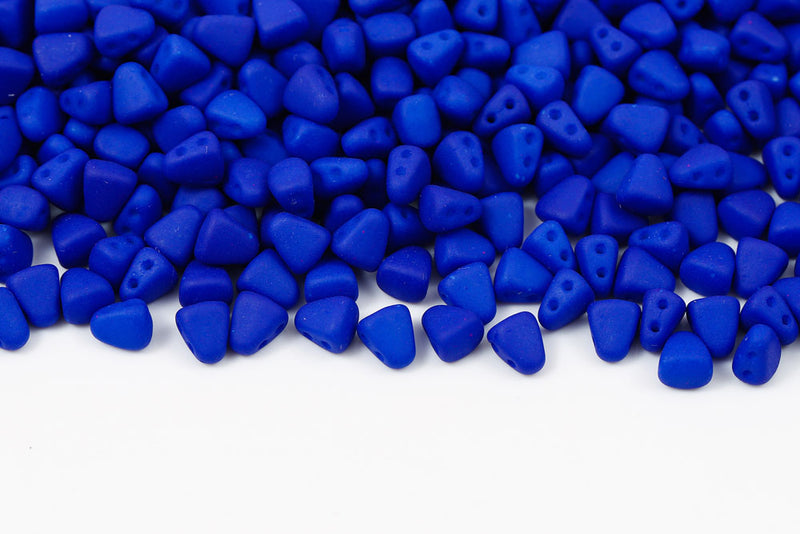 Nib-Bit 6×5mm Alabaster Blue Neon 2-Hole Czech Beads