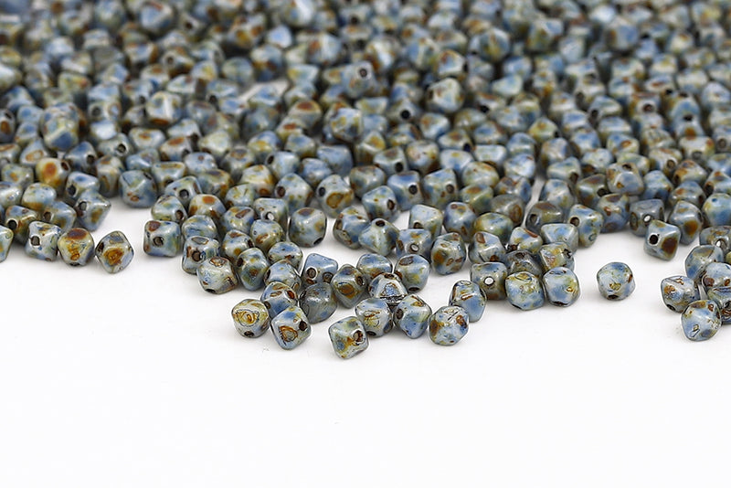 Bicone 4×4mm White With Blue Picasso Finish 1-hole Czech Beads