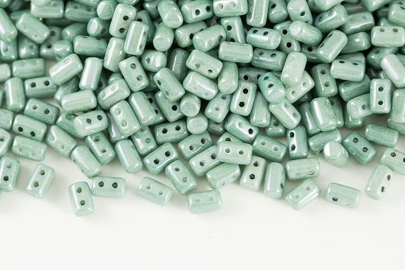 Rulla 5×3mm Opaque White Green Luster 2-Hole Glass Czech Beads