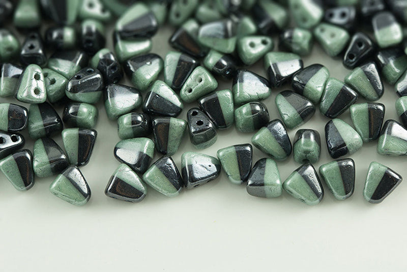 Nib-Bit 6×5mm Black/white Opaque Green Luster 2-Hole Czech Beads