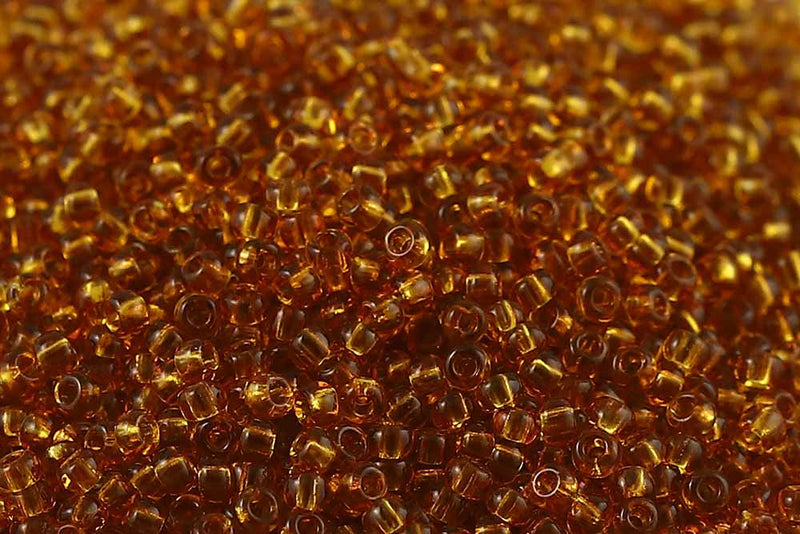 Preciosa Rocailles 11/0 Transparent Topaz col.10070