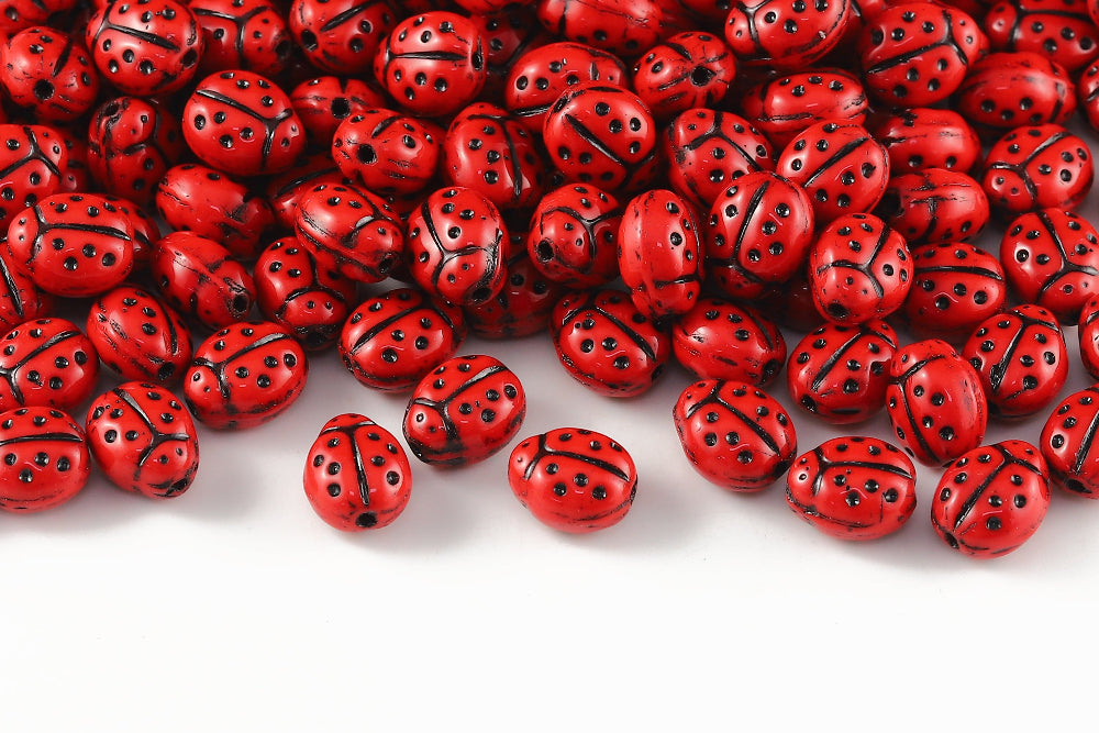 Ladybug 10×7mm Opaque Lt.Siam With Black 1-Hole Czech Beads