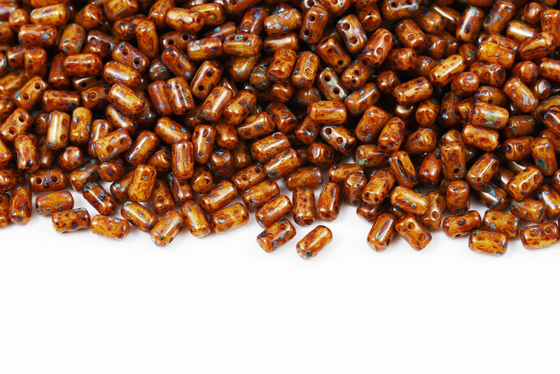 Rulla 5×3mm Opaque Ivory Travertine Dark 2-Hole Czech Beads