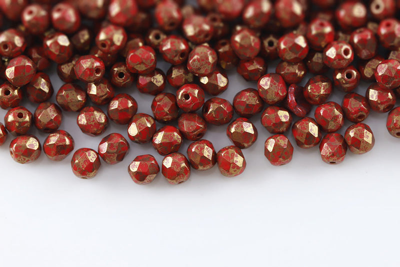 Czech Fire Polished 6mm Opaque Coral Red With Gold Marble Finish Round Beads
