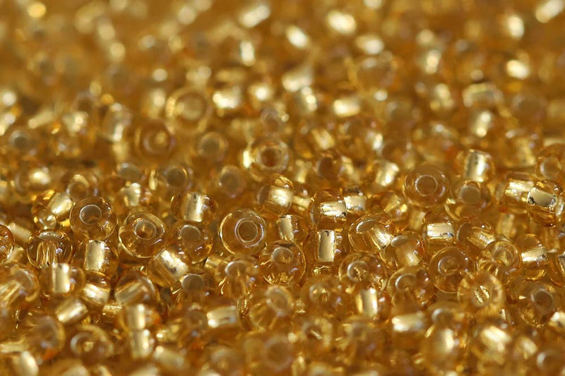 Preciosa Rocailles 10/0 Transparent Light Gold Silver Lined col.17020