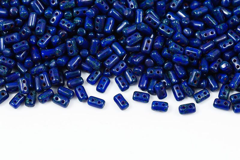 Rulla 5×3mm Opaque Blue Travertin Dark 2-Hole Czech Beads