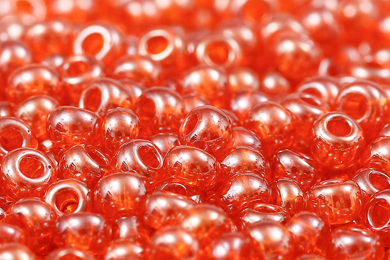 Preciosa Rocailles 6/0 Transparent Dark Orange Luster col.96030