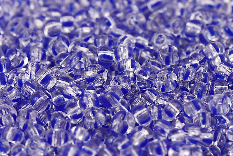 Preciosa Rocailles 8/0 Blue Stripes On Crystal Col.00330