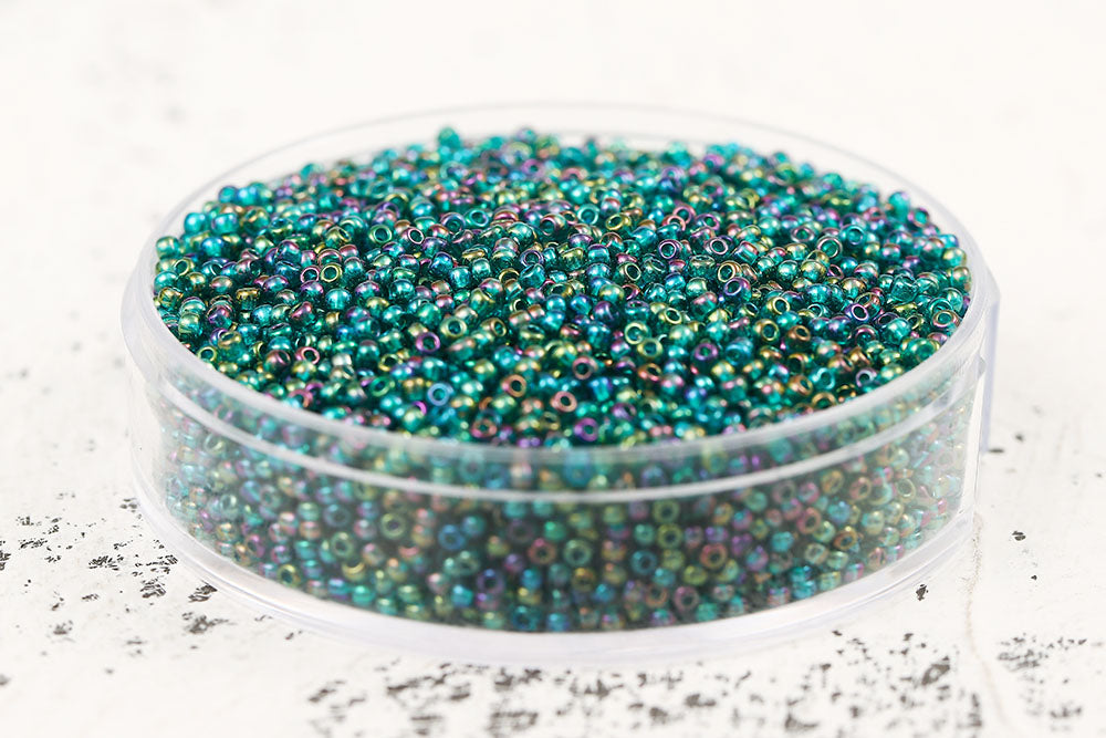 Preciosa Rocailles 11/0 Transparent Rainbow Teal Green col.51710
