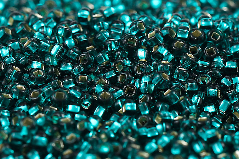 Preciosa Rocailles 11/0 Transparent Teal Green Silver Lined col.57710