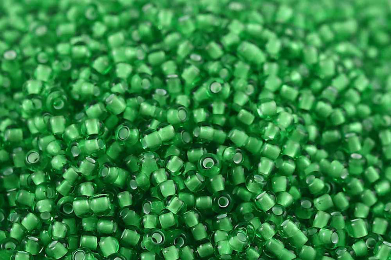 Preciosa Rocailles 11/0 Transparent Light Green White Lining col.55106