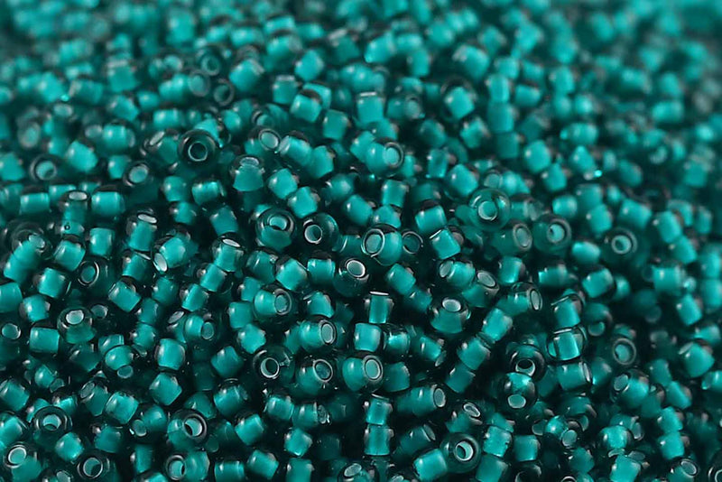 Preciosa Rocailles 11/0 Transparent Teal Green White Lining col.55716