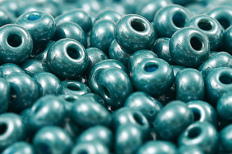 Preciosa Rocailles 6/0 Blue Green Lustered col.63025
