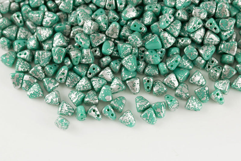 Nib-Bit 6×5mm Silver Splash Turquoise Green 2-Hole Czech Beads