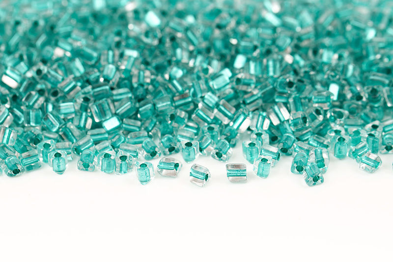 Preciosa Triangles 3.5×3.5mm Transparent Emerald Metallic Lined Col.68258