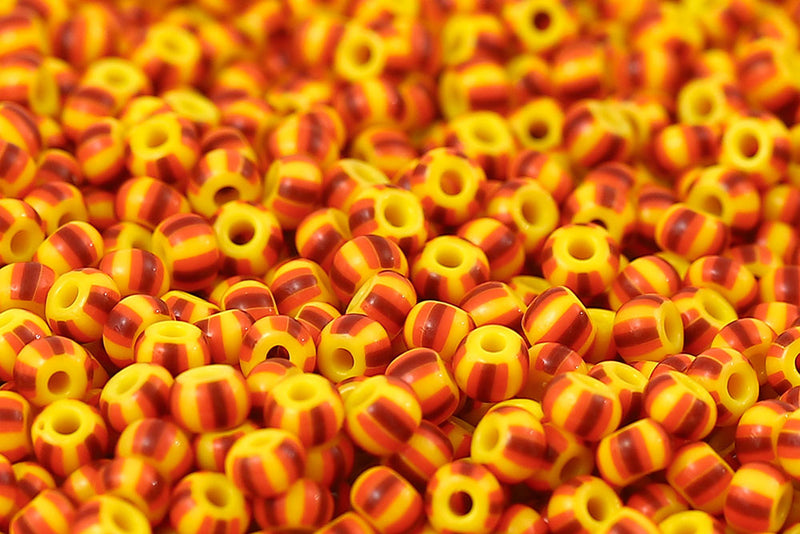 Preciosa Rocailles 6/0 Red Stripes On Yellow Col.83910
