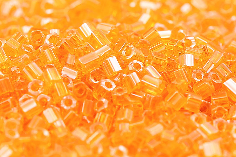 Preciosa 2-Cut 11/0 Transparent Amber Luster col.86060