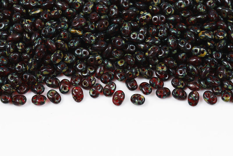 Miniduo 2×4mm Ruby Travertin Dark 2-Hole Czech Beads
