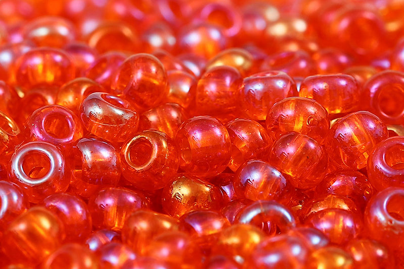 Preciosa Rocailles 10/0 Transparent Dark Orange Rainbow col.91030