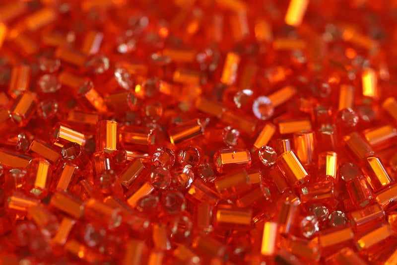 Preciosa Bugles 1″ Transparent Dark Orange Silver Lined col.97030