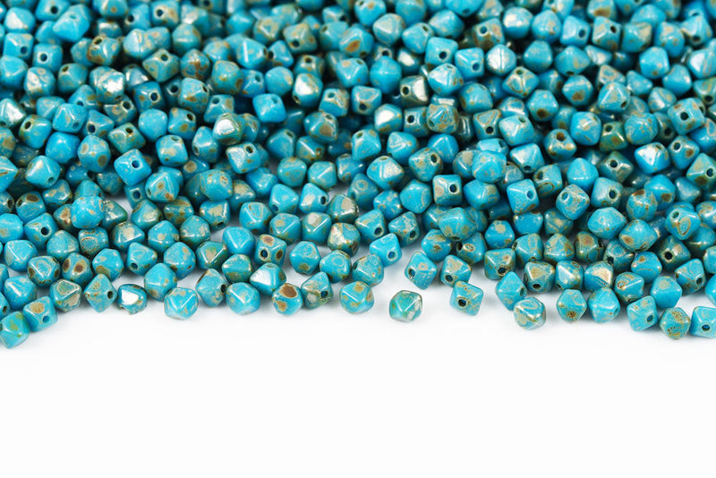 Bicone 4×4mm Turquoise Drak Blue Picasso 1-hole Czech Beads