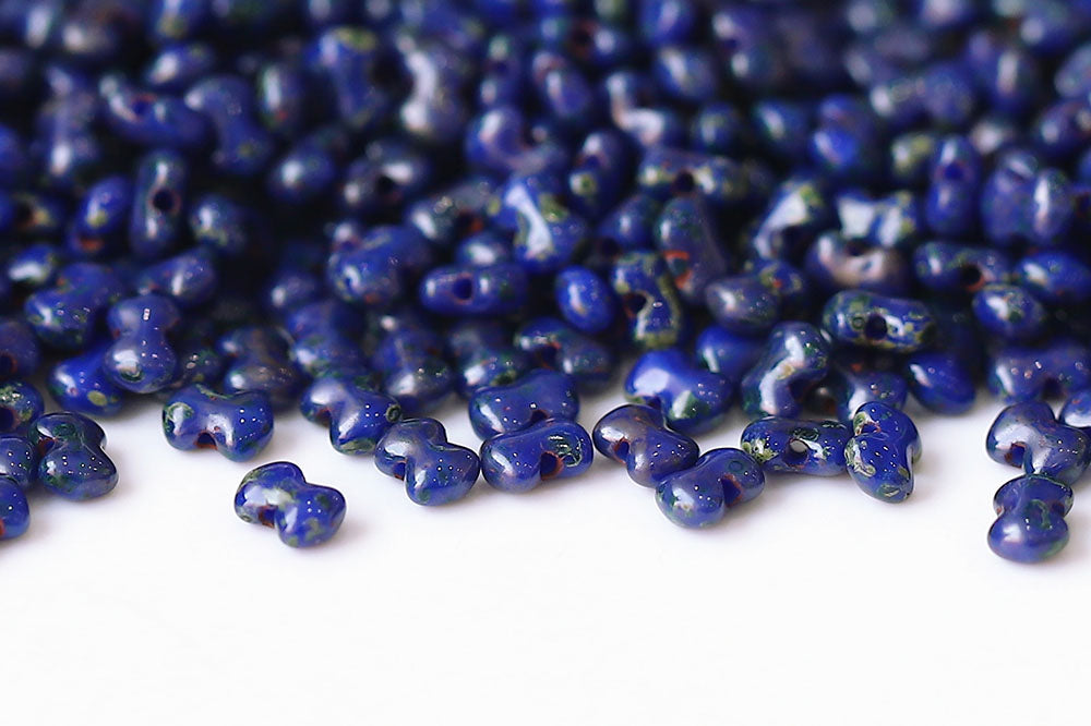 Butterfly 3×4mm Opaque Blue Travertin 1-Hole Czech Beads
