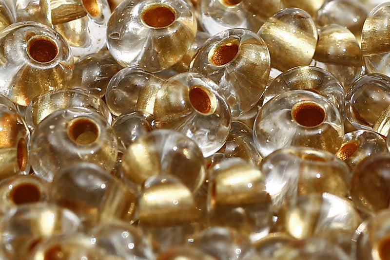 Preciosa Drops 5/0 Transparent Orange Metallic Lined Col.68284