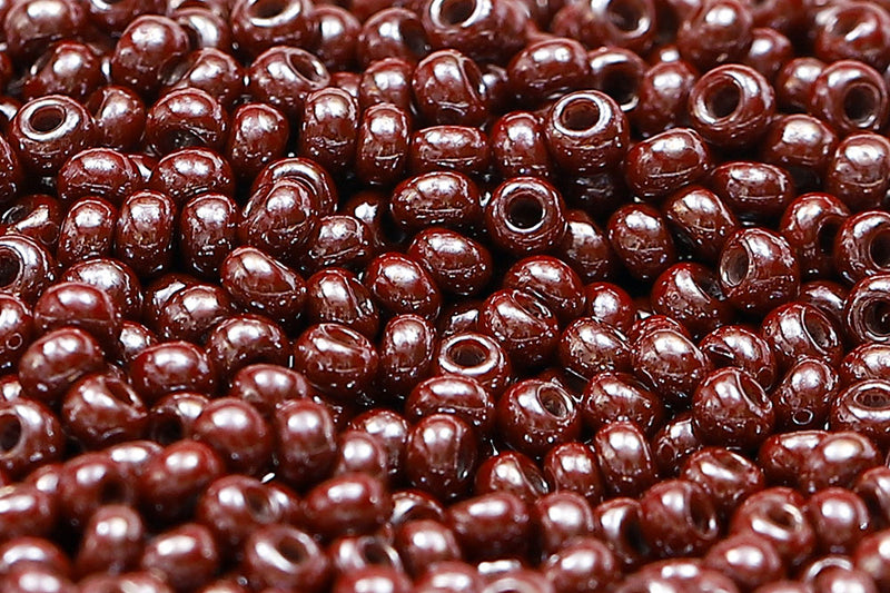 Preciosa Rocailles 11/0 Opaque Red Brown Lustered col.18601