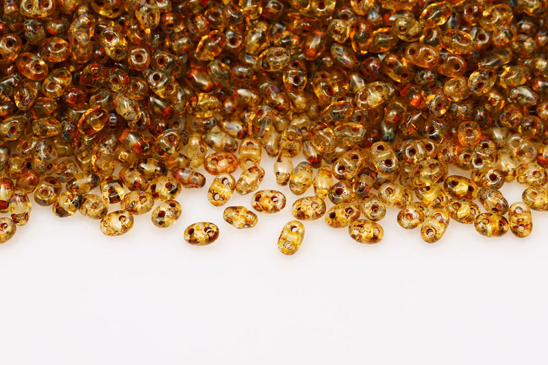 Miniduo 2×4mm Crystal Travertin Dark 2-Hole Czech Beads