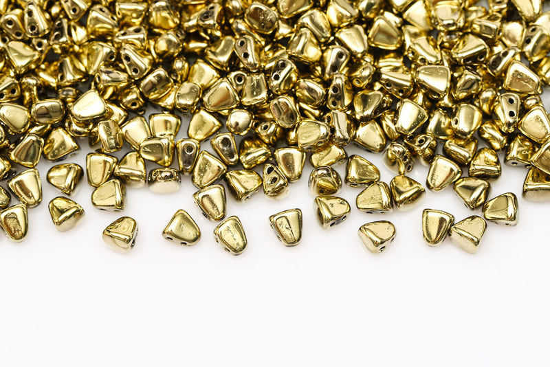 Nib-Bit 6×5mm Crystal Full Amber 2-Hole Czech Beads