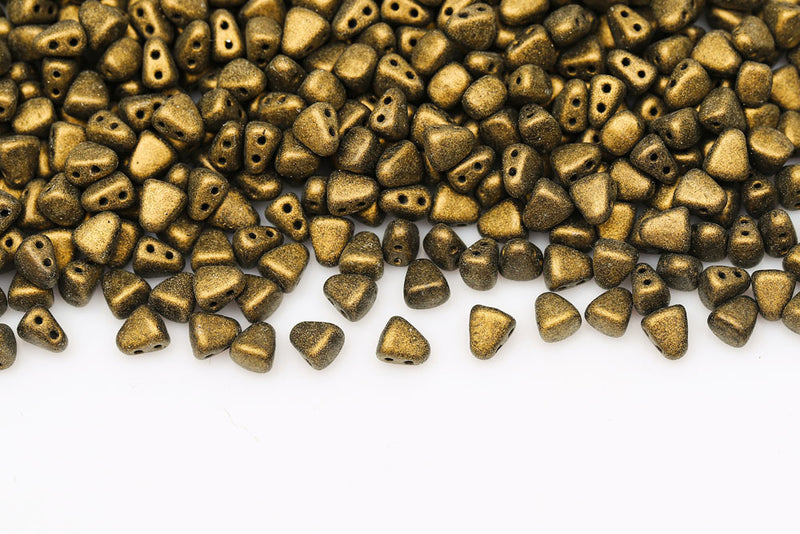Nib-Bit 6×5mm Metallic Suede Gold 2-Hole Czech Beads