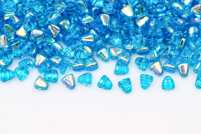 Nib-Bit 6×5mm Aquamarine Ab 2-Hole Czech Beads