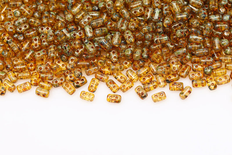 Rulla 5×3mm Crystal Travertin Dark 2-Hole Czech Beads