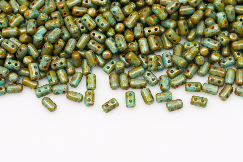 Rulla 5×3mm Turquoise Blue Travertin Dark 2-Hole Czech Beads