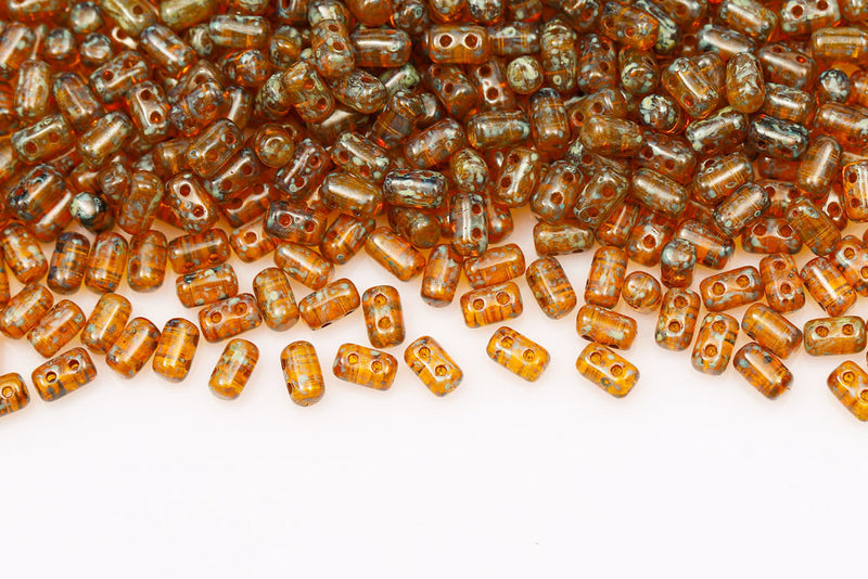 Rulla 5×3mm Amber Travertin Dark 2-Hole Czech Beads