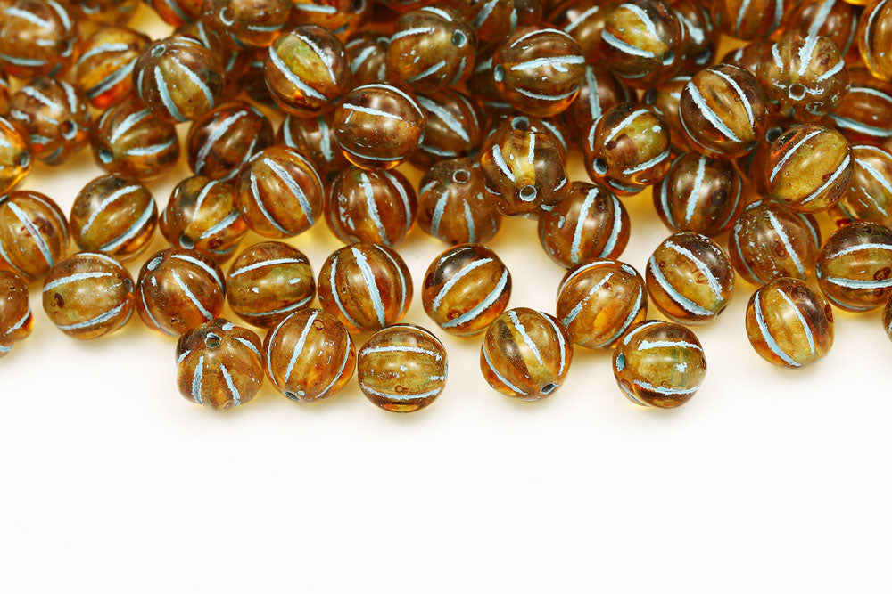 Melon 8mm Crystal Travertin With Blue Czech Beads