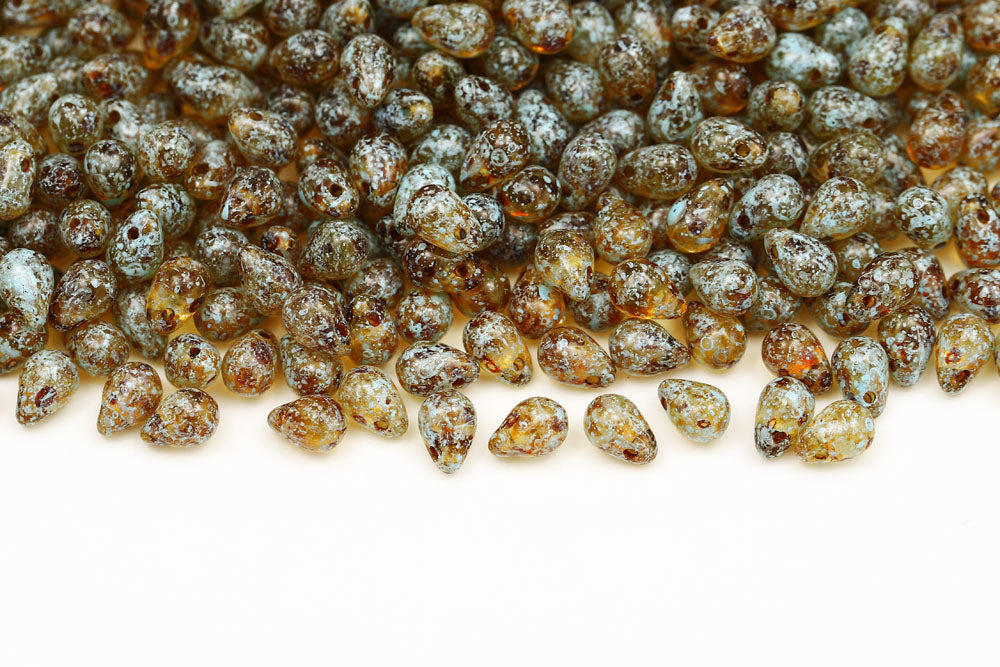 Drops 4×6mm Blue Splash Crystal Travertin Czech Beads