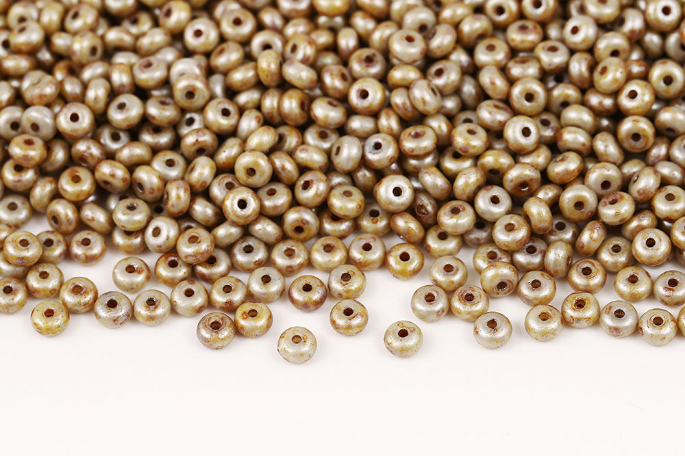 Spacer 2.5×4mm Chalk Ivory Marble Finish 1-Hole Czech Beads