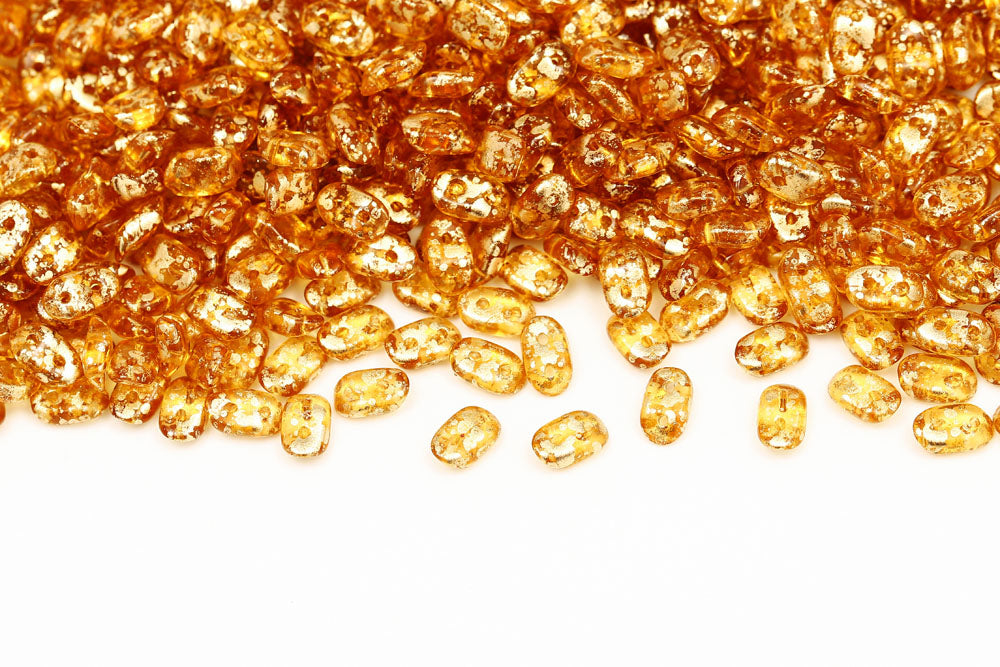 Wave 3×7mm Gold Splash Topaz 2-Hole Czech Beads